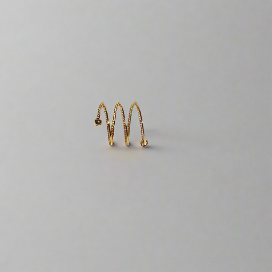 Adjustable twist spring ring
